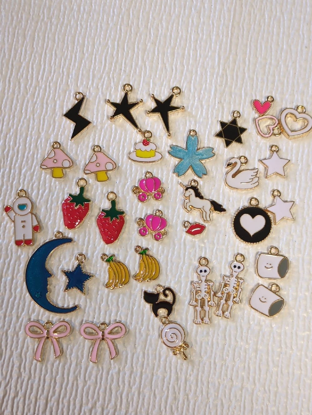 💚4/$10💚P50 Assorted Pink, Blue & Gold  Charms Pack
